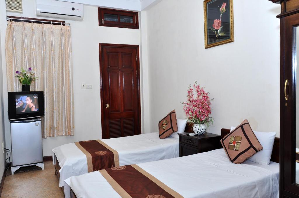 Sweet Family Guest House Hanoi Ruang foto